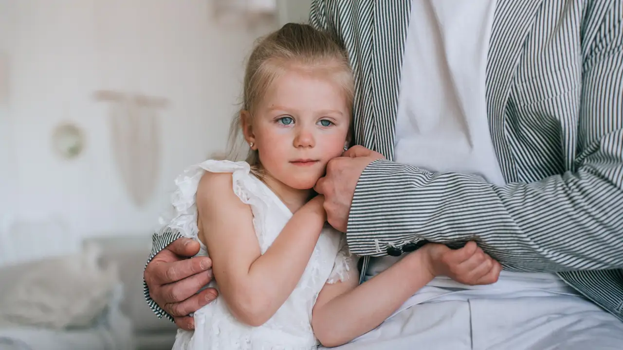Niña con su padre